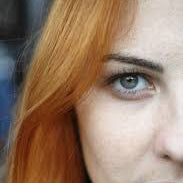 Hazel eye on red head