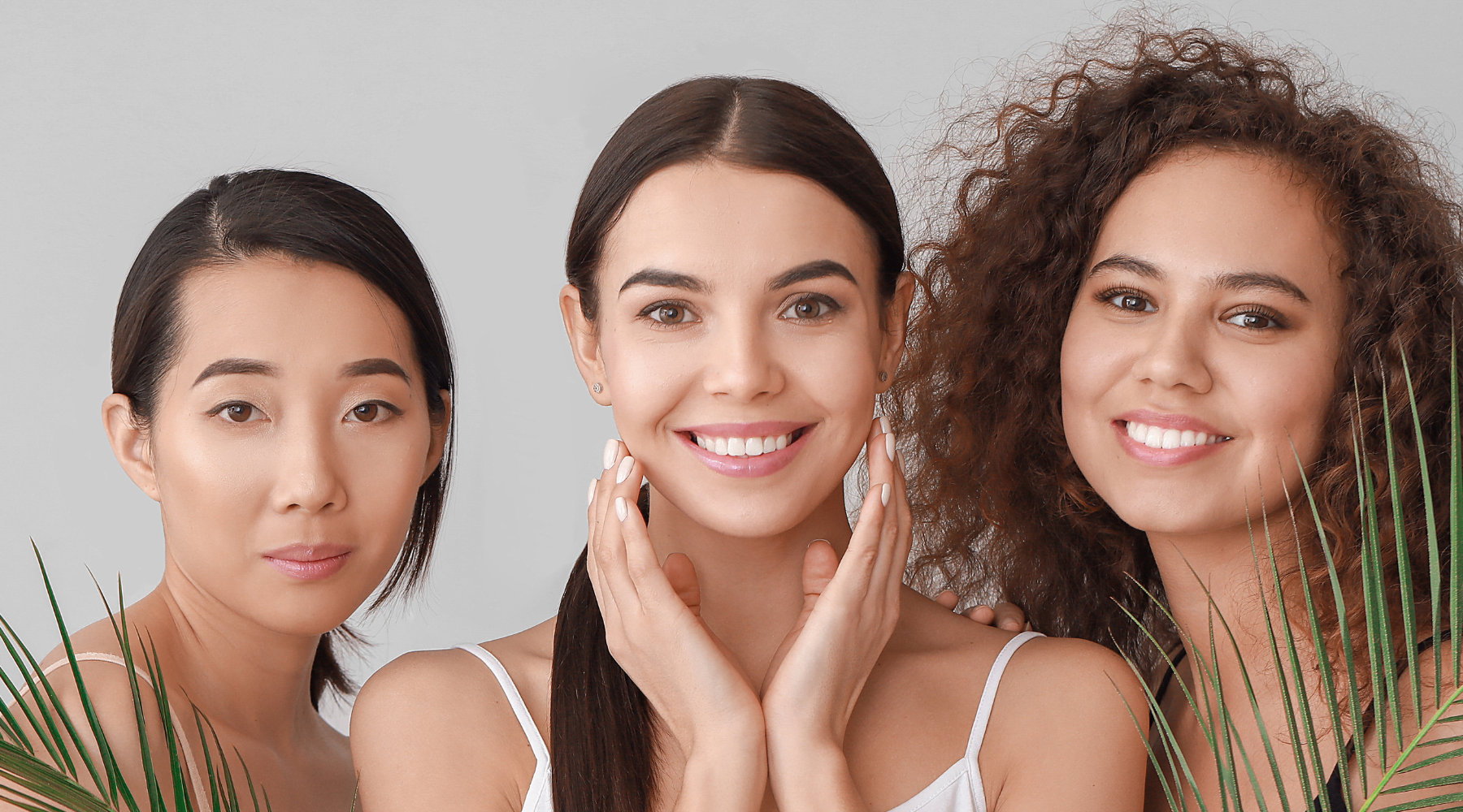 Three women smiling